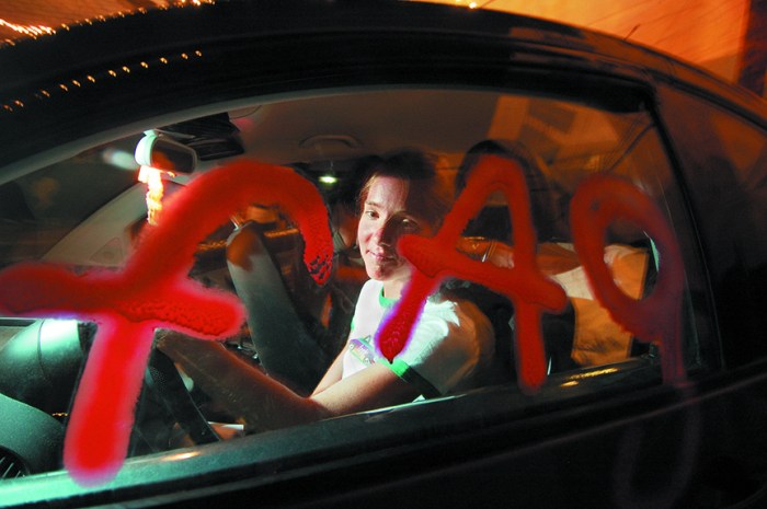 Erin Davies inside her "fag bug" car at the Beauty Bar on July 26, 2007. Photo by Bill Hughes